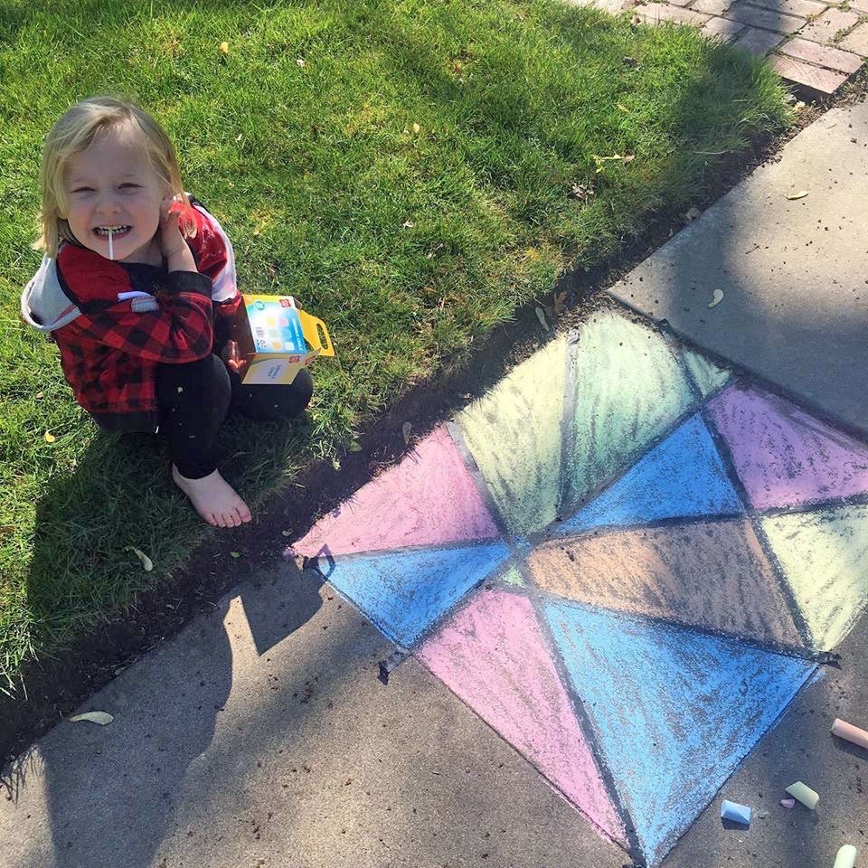 Peel back the tape and enjoy your stained-glass mosaic chalk art.