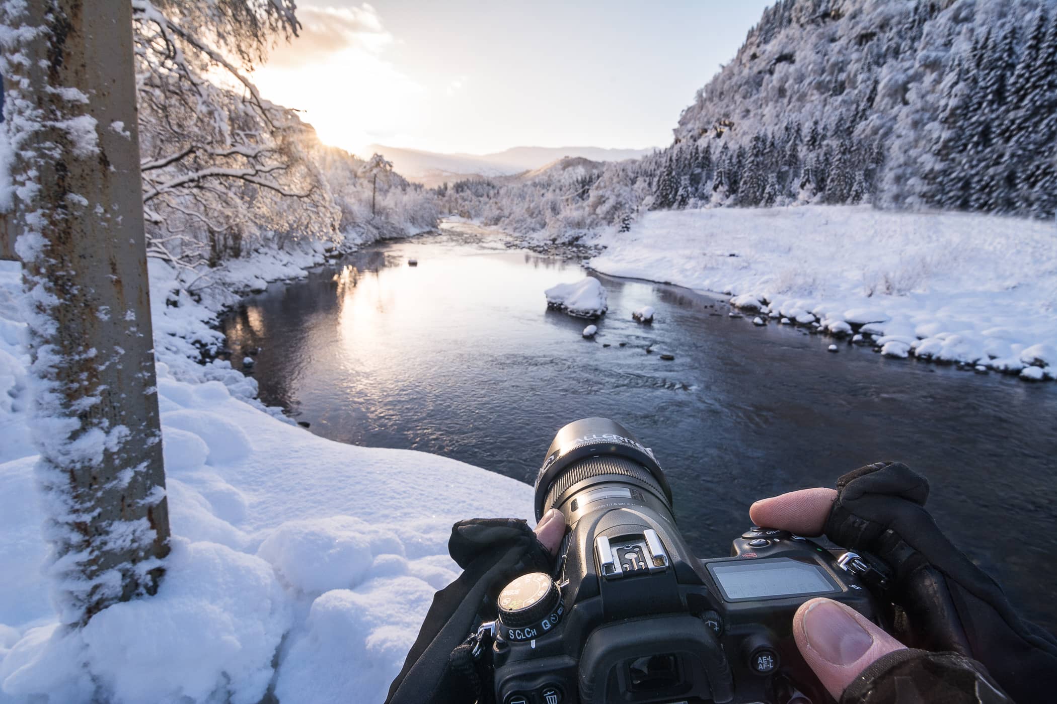 photographing a river in winter