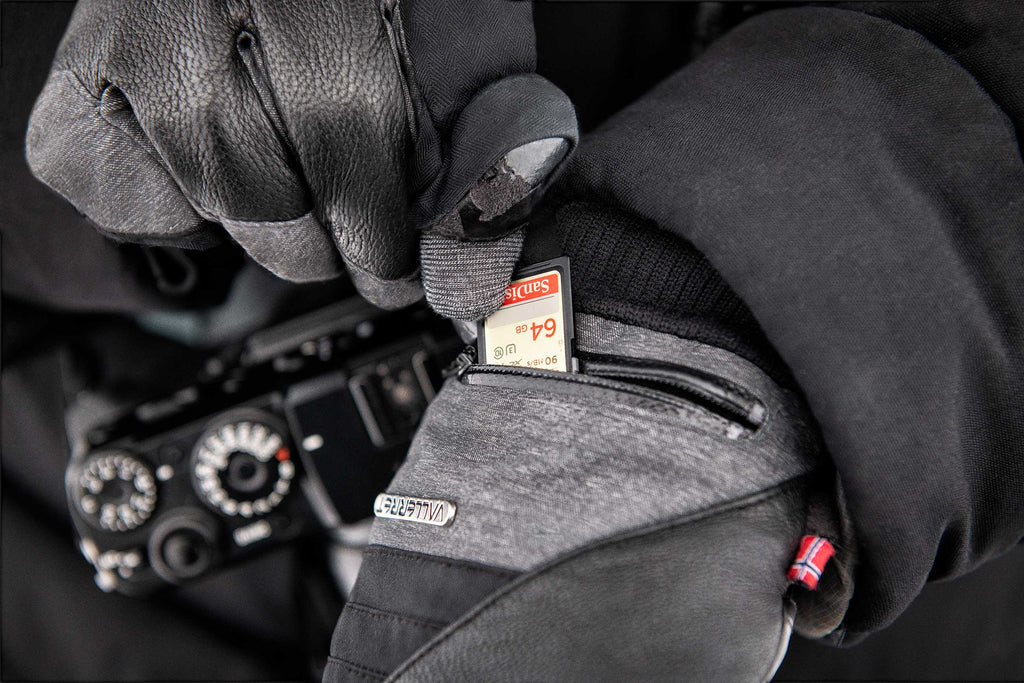 SD card stored in the pocket of a photography gloves