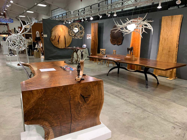 Claro Walnut live edge waterfall leg desk top with shed antler leg