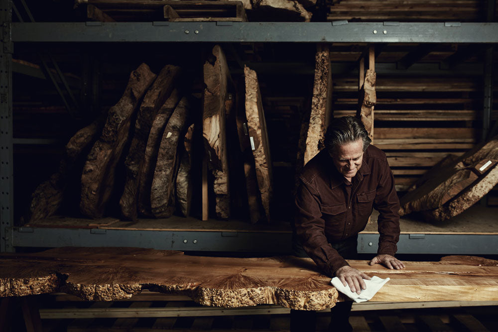 Kent Mace, CS Woods owner, polishing a burl. 