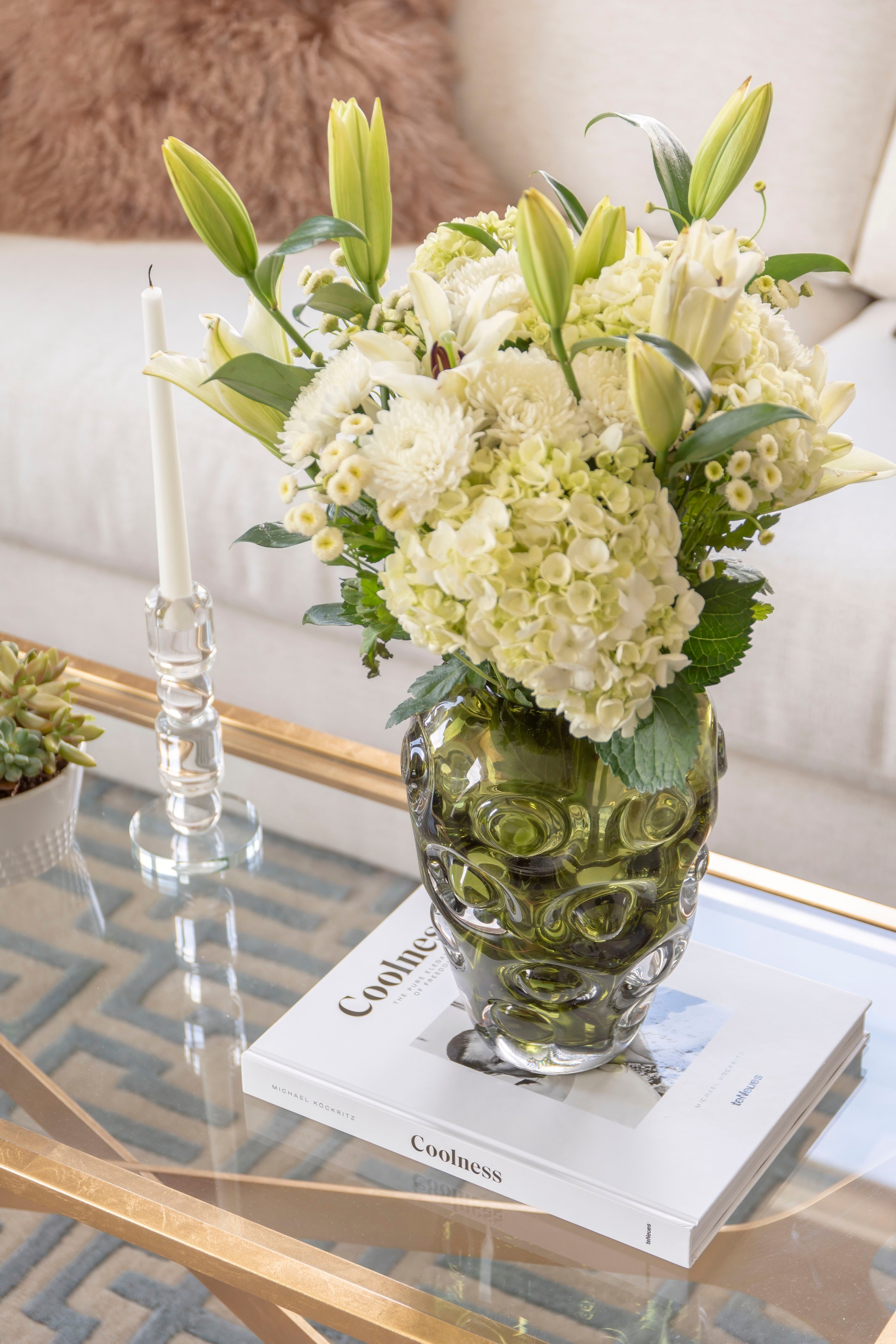 CB2 green bubble vase on goldleaf coffee table by Kevin Francis Design