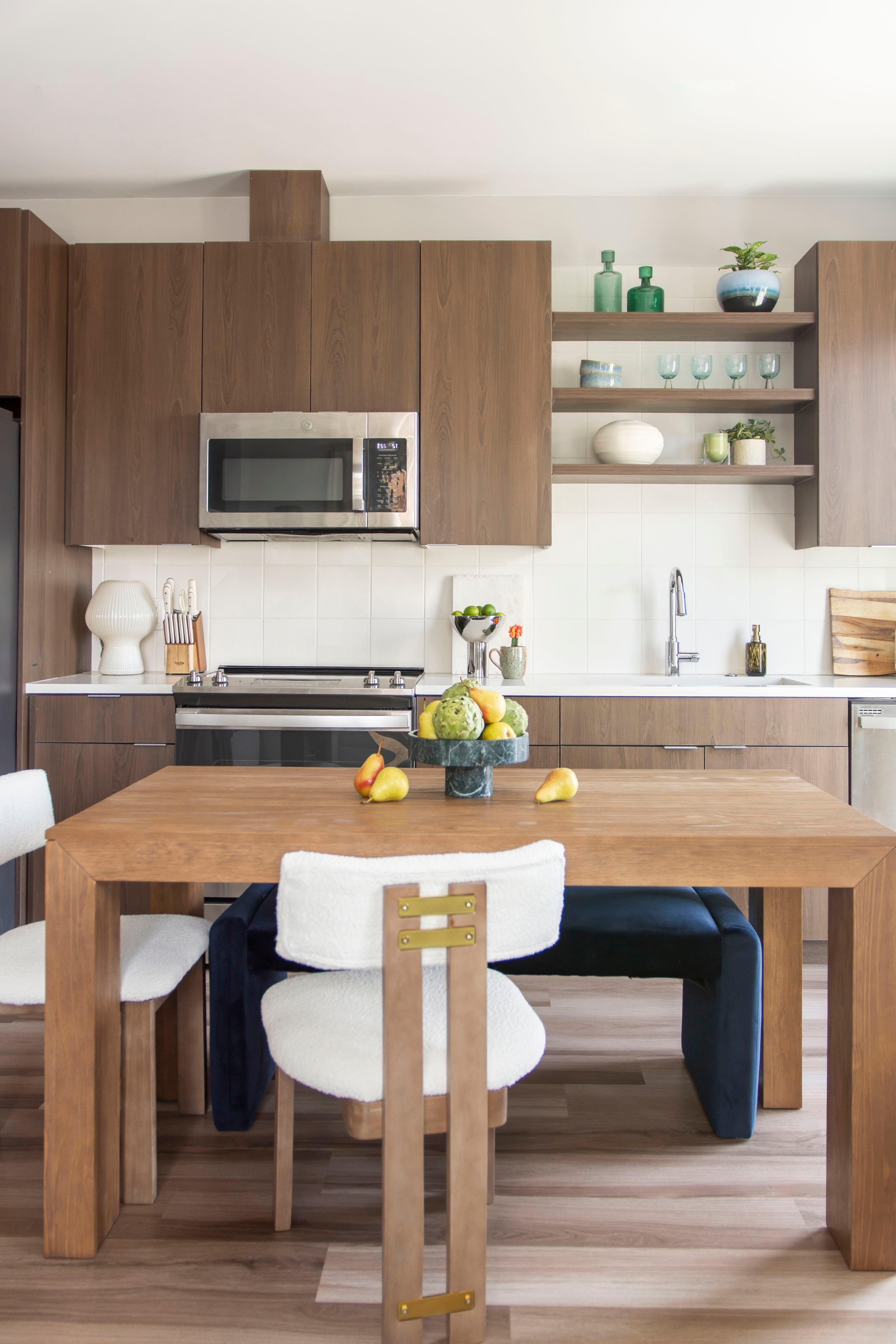 Modern LoHi Denver apartment design with Plank+Beam solid wood dining table in Walnut finish on the Francis Files design blog