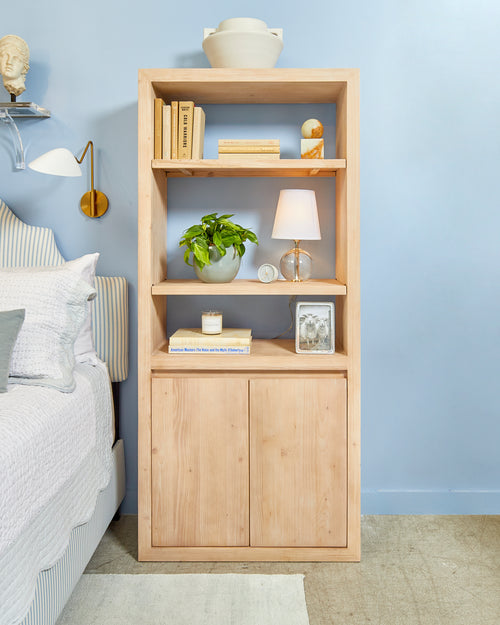 Blue monochrome New Traditional style blue bedroom design by Kevin Francis O'Gara for Small/Cool NYC 2023, featuring Clare Cloud Watching blue paint, bust statue, striped bed, and bookcase by bed on The Francis Files design blog