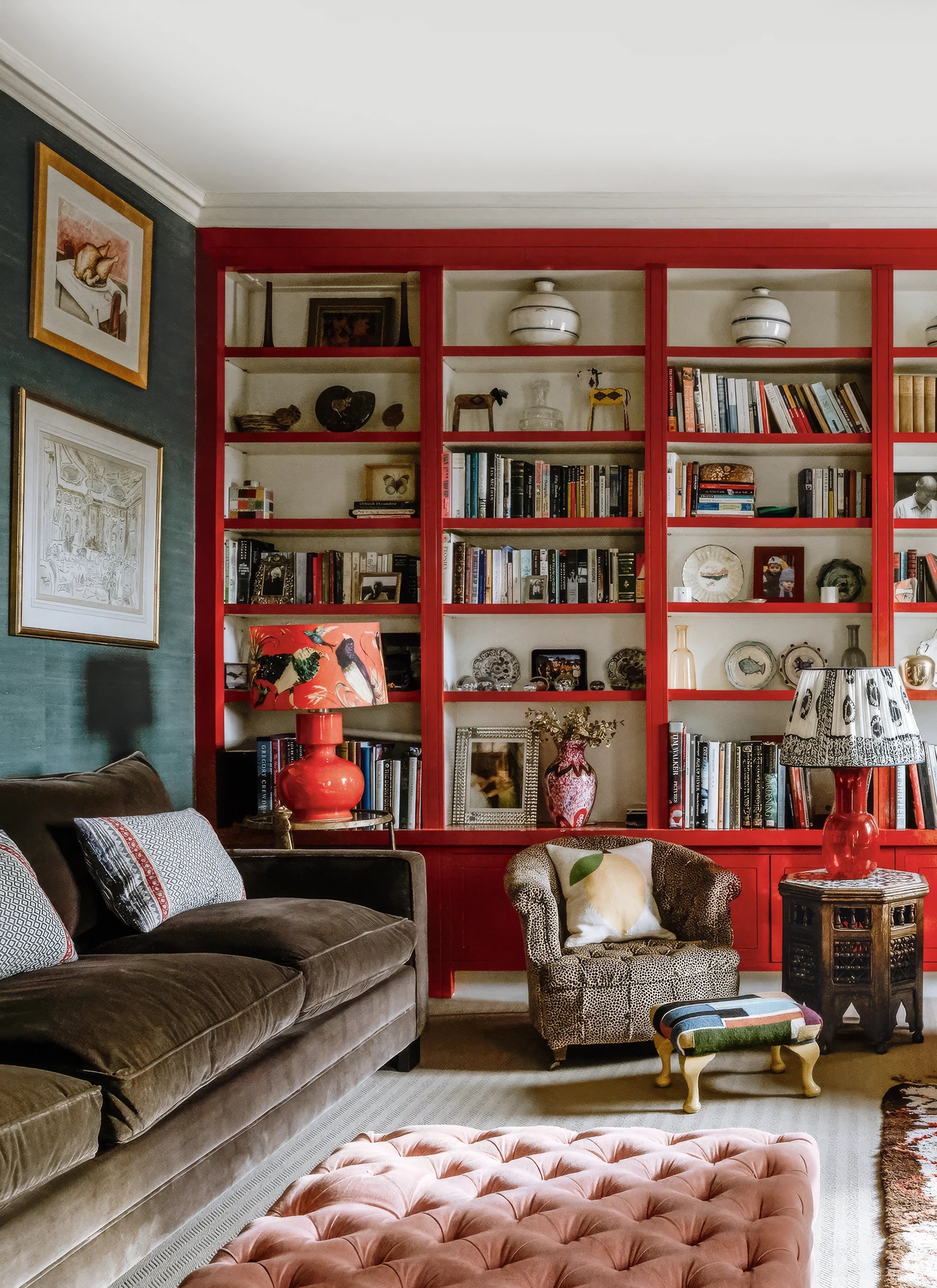 Chelsea, London flat with red painted built-in bookshelves, designer shelf styling tips and decor on The Francis Files