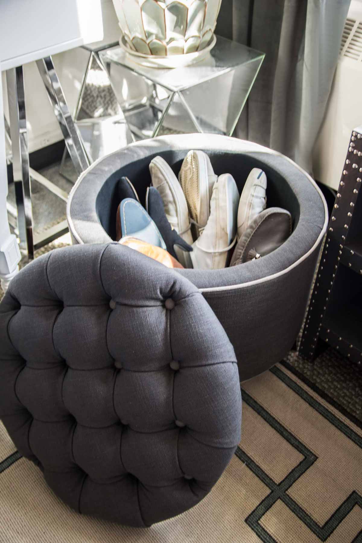 Grey tufted storage ottoman for easy shoe access on Thou Swell @thouswellblog