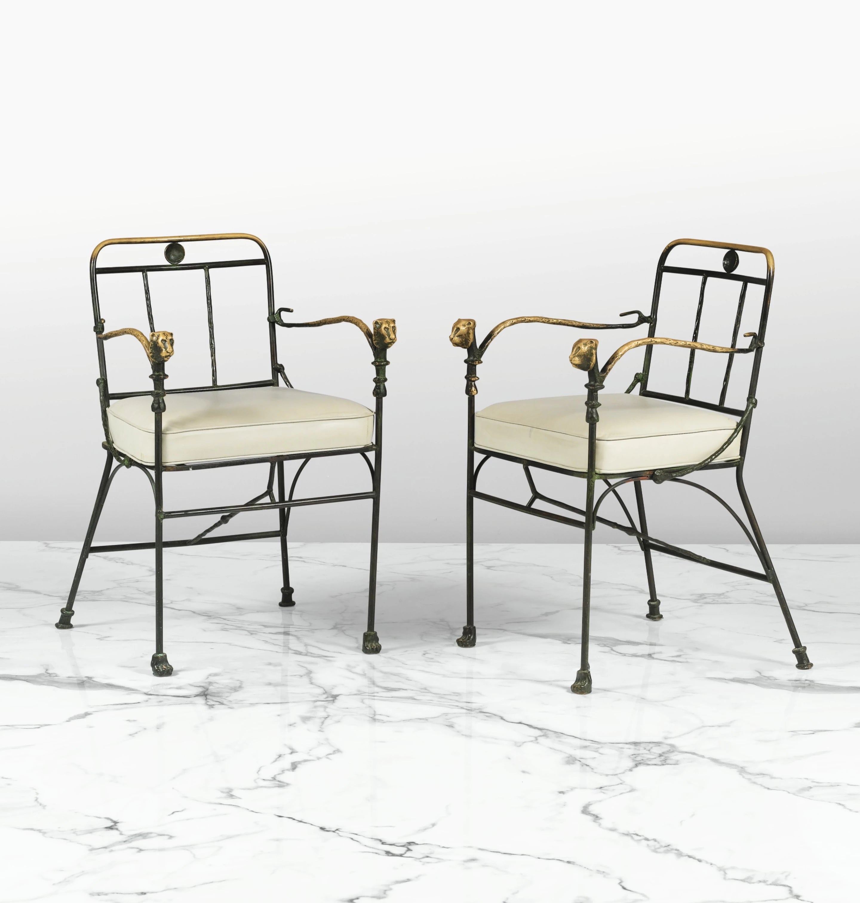 Pair of Têtes de Lionnes bronze armchairs by Diego Giacometti