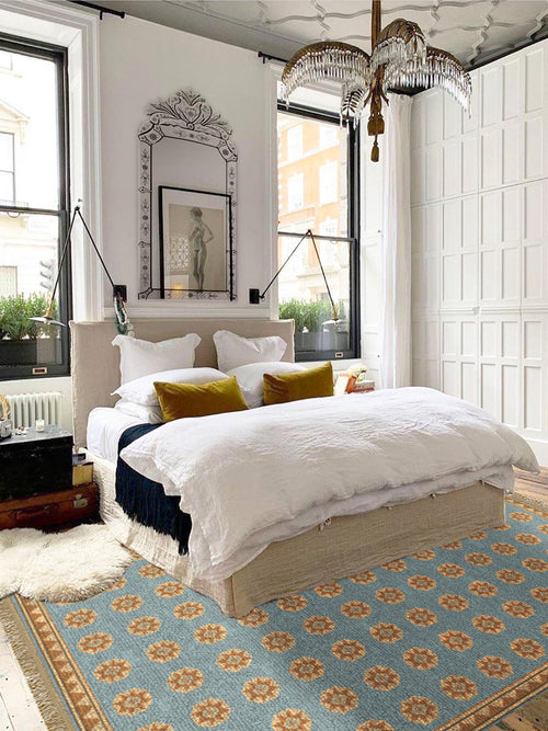 Eclectic bedroom design with Kevin Francis Design Mamluk hand-knotted wool rug design, sun medallions, loft bedroom, apartment design