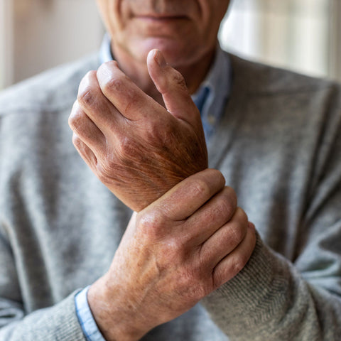 Man with arthritis in wrists and hands