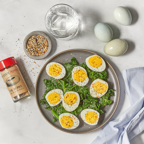 Boiled eggs and arugula with everything seasoning.