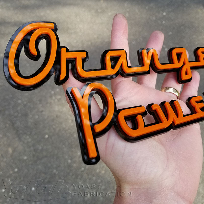 Custom orange and black emblems