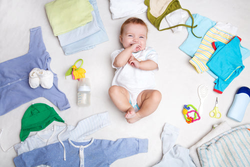 https://cdn.shopify.com/s/files/1/0074/6402/6227/files/Baby-on-white-background-with-clothing.jpg?v=1550105502