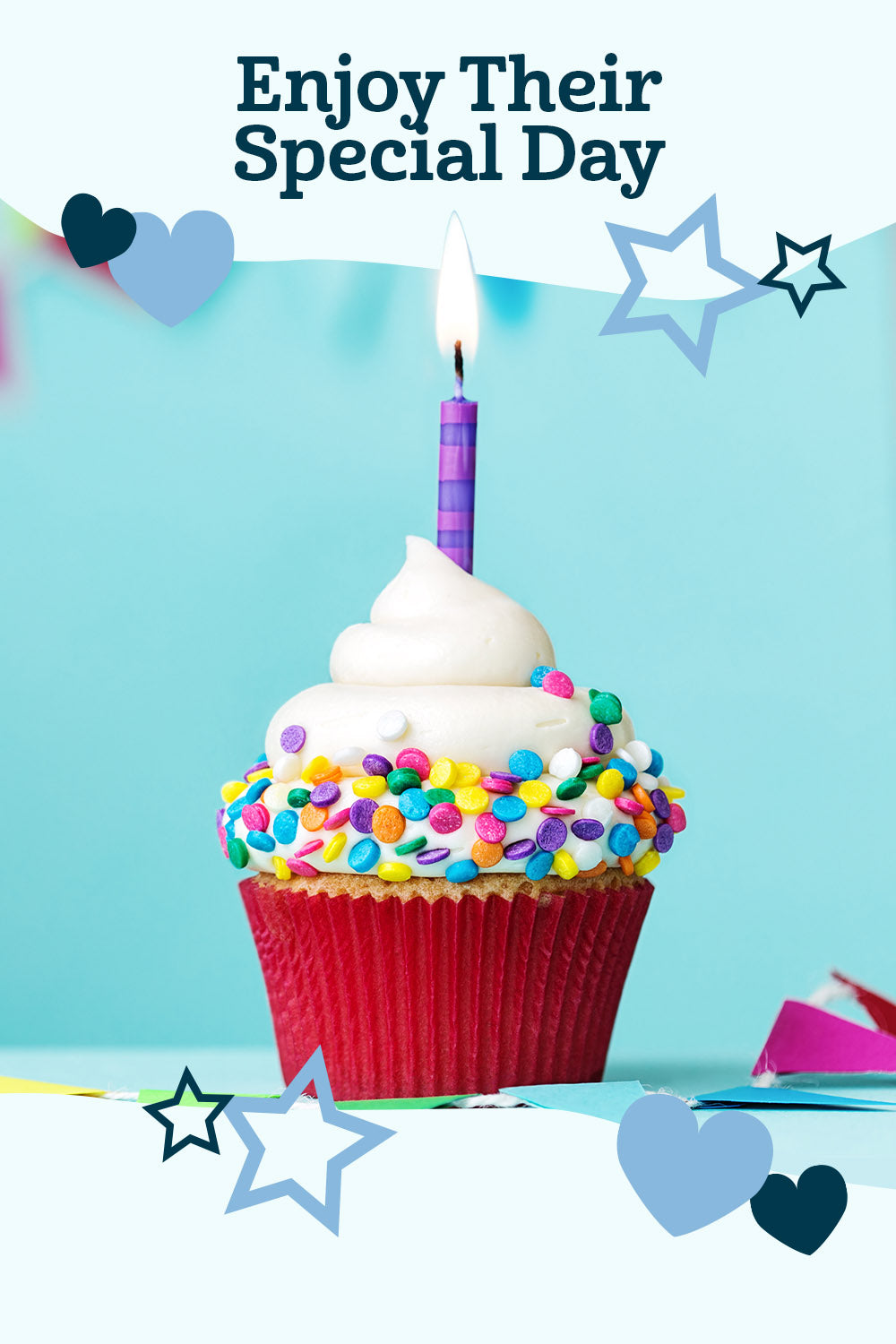 Birthday cupcake with confetti and striped purple candle