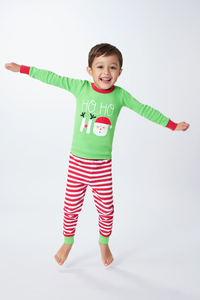 Toddler Boy Wearing Two-Piece Holiday Cotton Pajama Set with Santa and Stripes