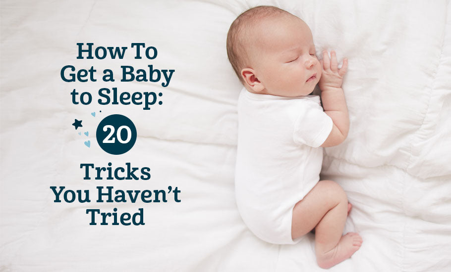 Baby shown sleeping on side in a white onesie with text saying "How To Get a Baby to Sleep: 20 Tricks You Haven’t Tried"