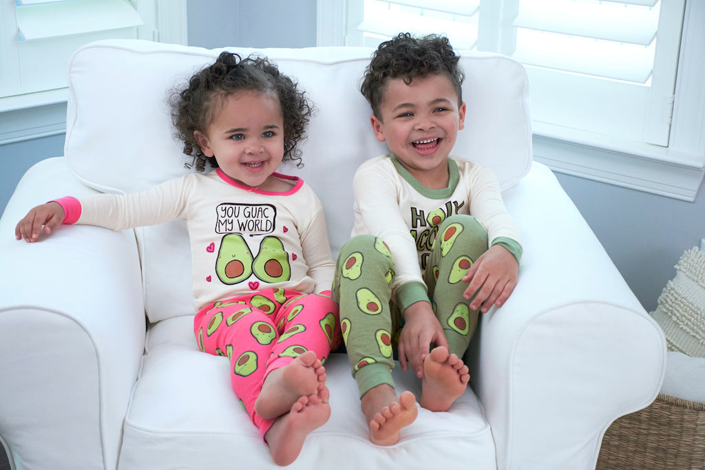 Sibling Toddler Girl and Toddler Boy Wearing Coordinating Avocado Pajama Sets