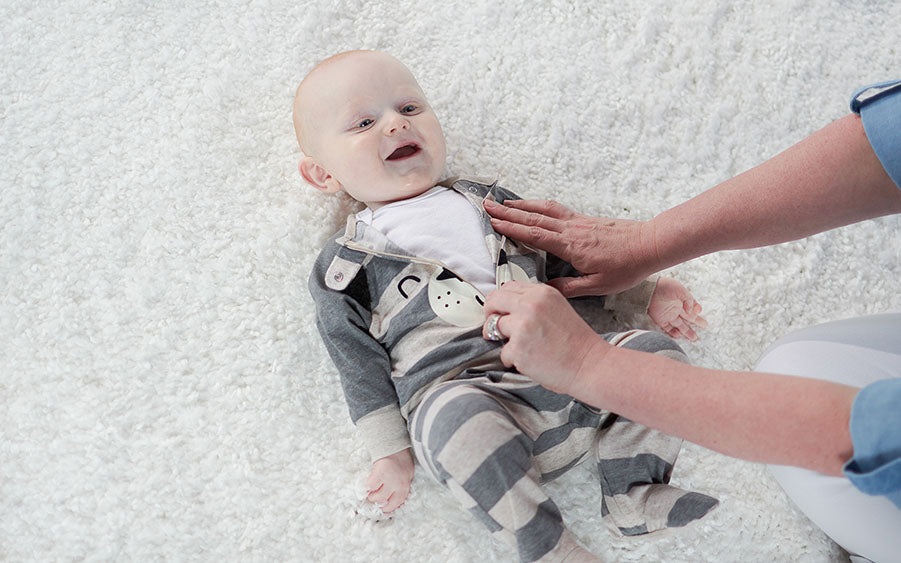 baby in bear bodysuit