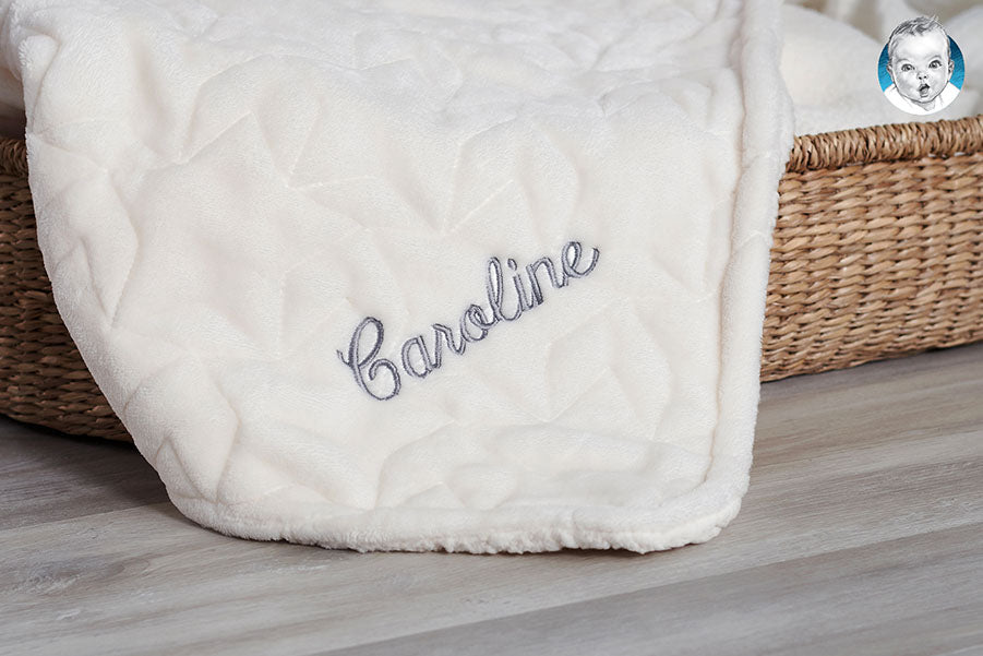 Wrap your little one in pure comfort with our exquisite personalized baby blanket. Featuring an embroidered name, this soft and cozy blanket is the perfect keepsake for your precious bundle of joy. Order now and create lasting memories with this charming addition to your nursery decor.