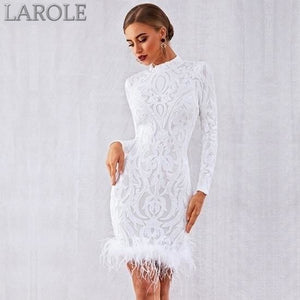 white sequin dress with feathers