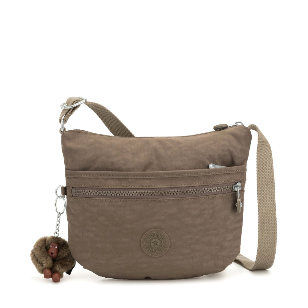 handbag with monkey keychain