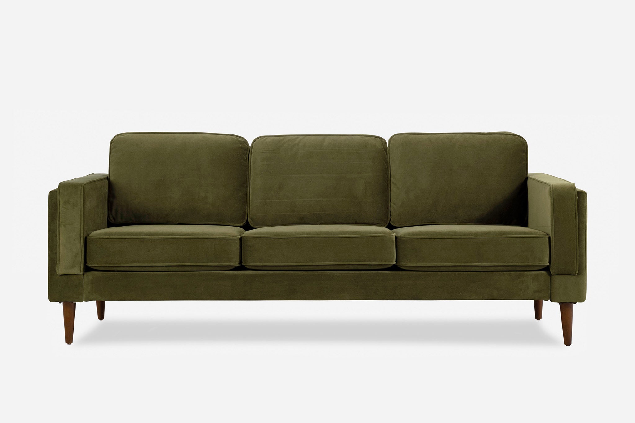 albany sofa shown in olive velvet with walnut legs