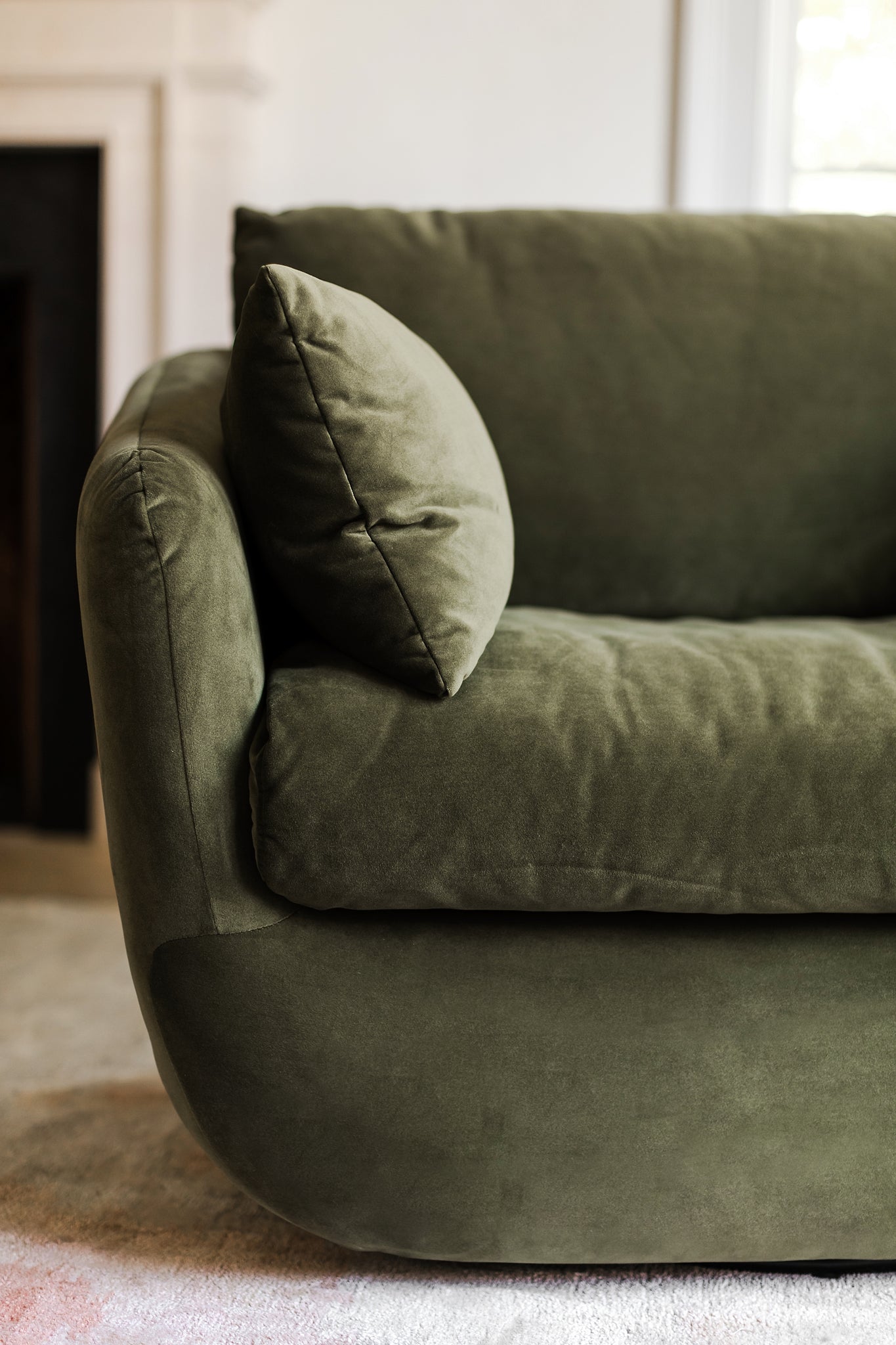detail of the park swivel armrest in olive velvet