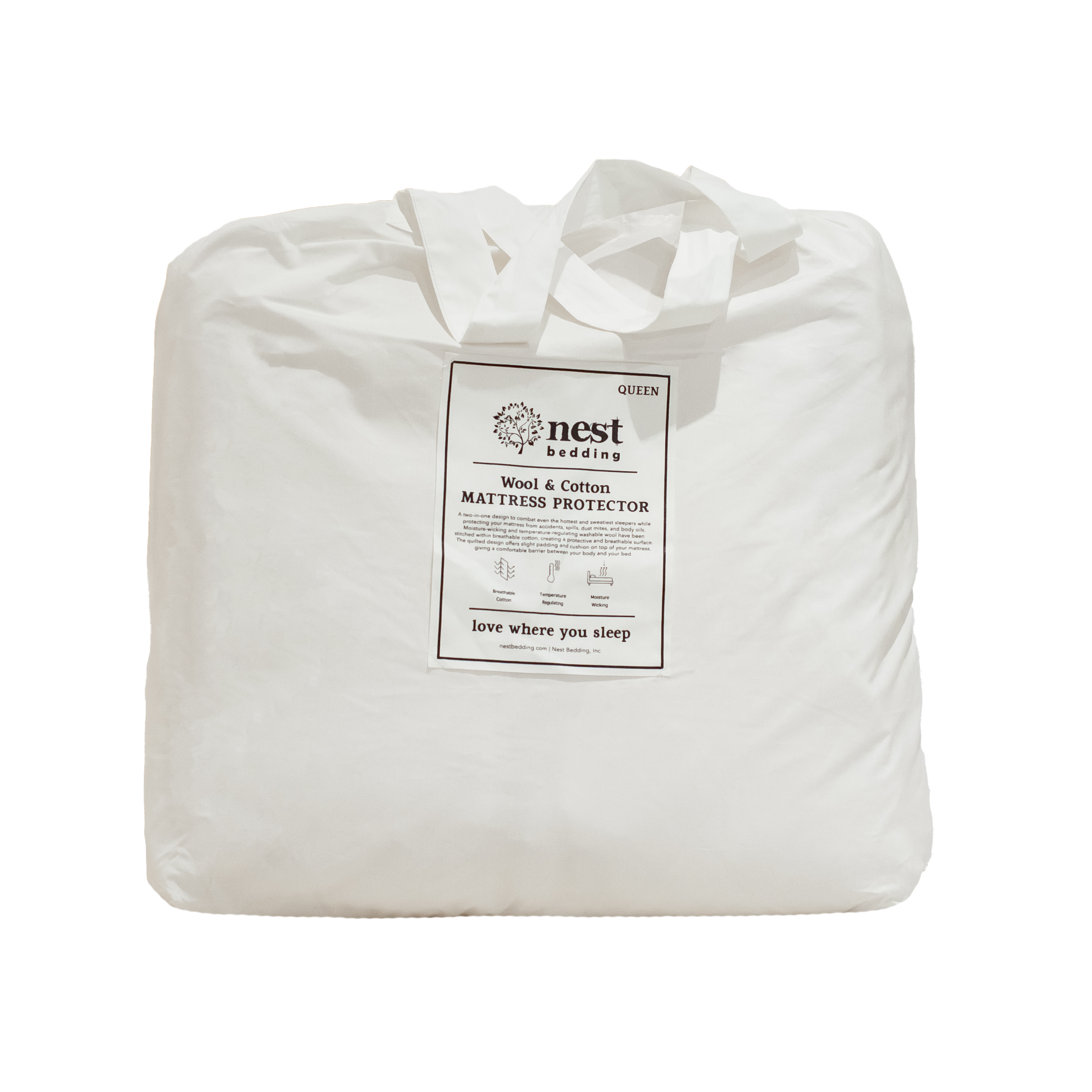 wool and cotton mattress protector in cotton carry tote