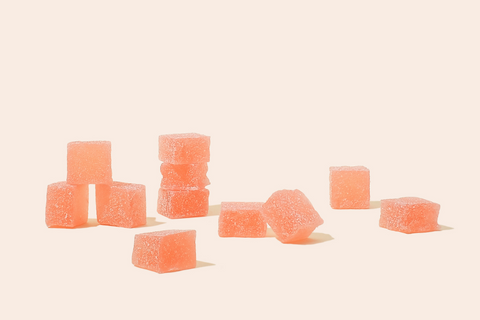 watermelon cube gummies scattered