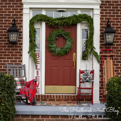 Fresh Port Orford Cedar Garland, deep green, lacy and delicate appearance hanging over a front door.