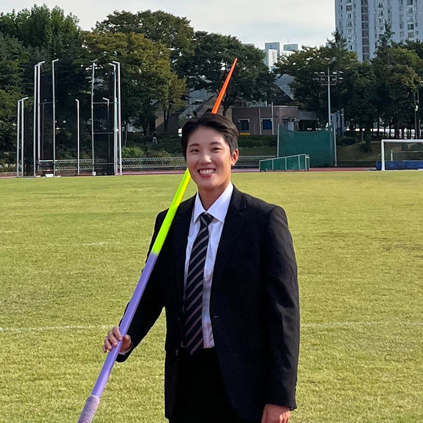 Park Ah Young smiling while holding her Javelin
