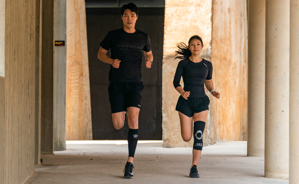 two models mid run down an outside corridor wearing the wave wear knee sleeves and athletic clothes