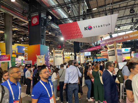 A display of many different companies and brands displays at Viva Tech in Paris