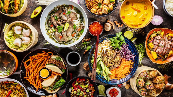 An Ariel view of a large assortment of cuisines on a table