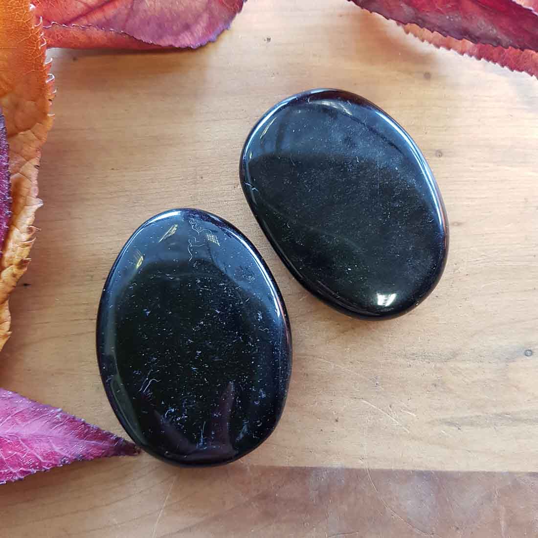 burgundy and black obsidian stone