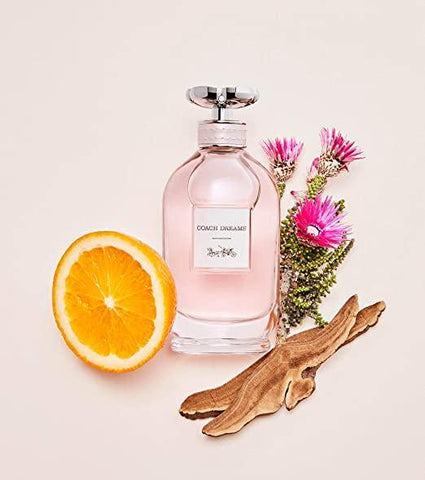 Coach Dreams Perfume, was launched by Coach in 2020. The composition begins with a bright opening layer that is formed by refreshing notes of pear, bitter orange, and a blend of additional fruity notes, floral notes, and woody notes at the dry down. 2021 batch.