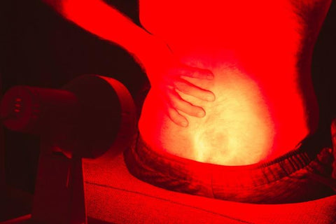 Patient exposed to red light therapy on the back