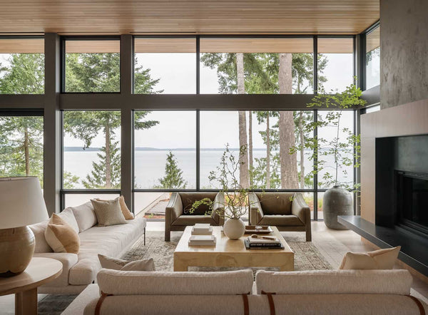 A Scandinavian lake house design features a minimalist style with practical furnishings