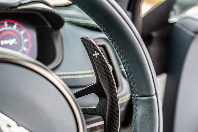 A carbon fibre shift paddle of the AMG-sourced 9-speed automatic transmission. These have a lovely tactile action and feel.