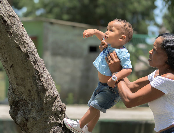 Kaj on his 1st birthday photoshoot at Botanic Gardens with his grandmother