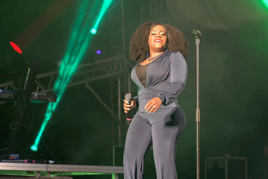 Etana struts across the stage at WCMF 2019