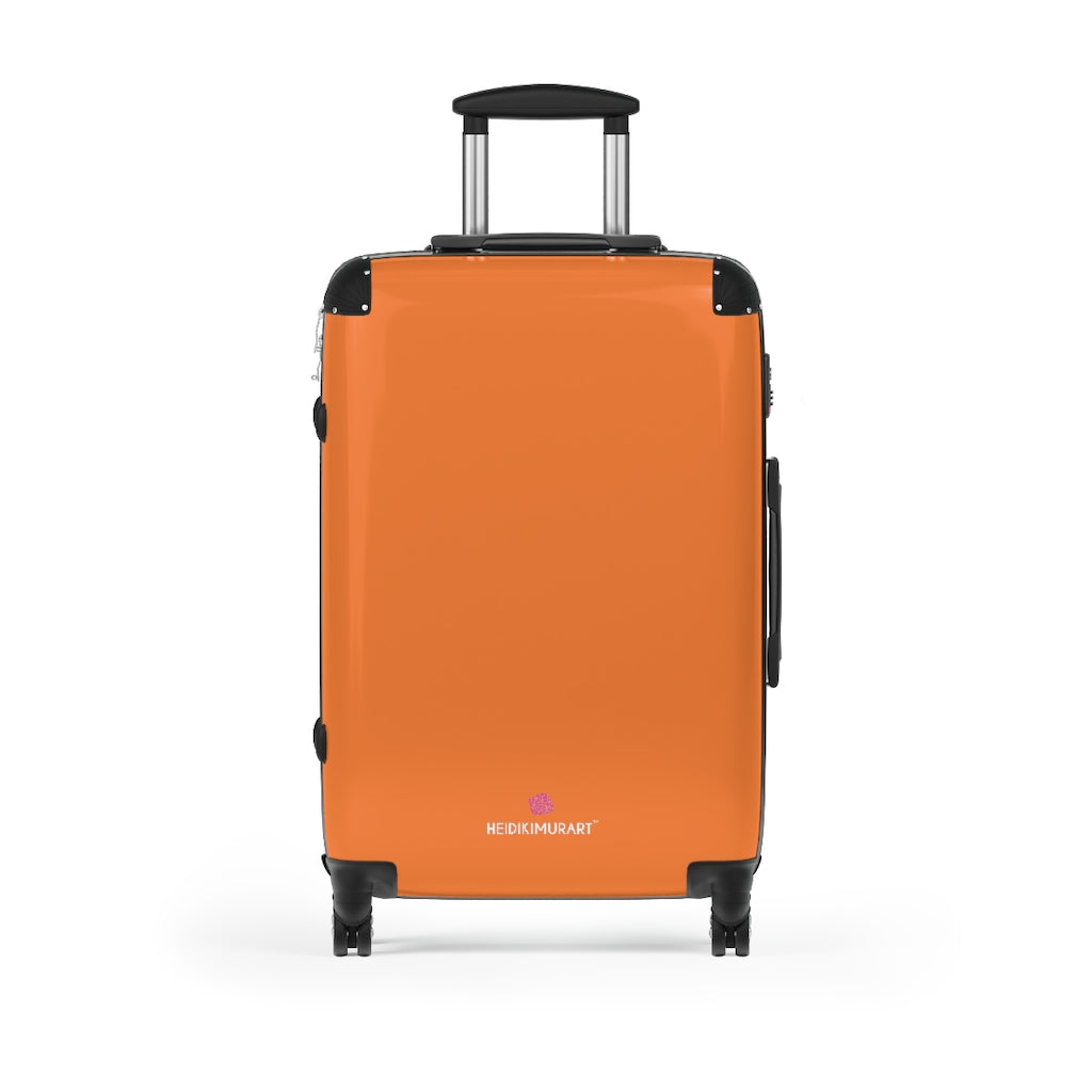 small orange suitcase