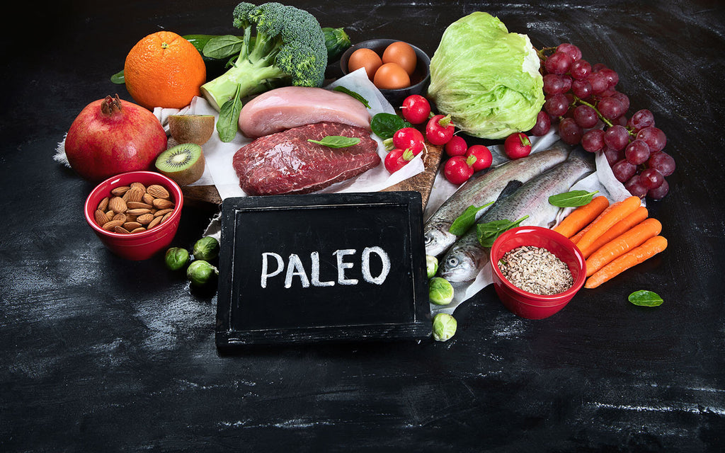 paleo vs keto: Various paleo diet products on a black surface