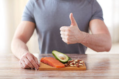 paleo diet man with thumbs up