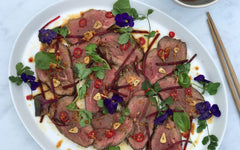 plate of beef salad with chilli and lime coconut