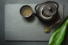 green tea in black teapot