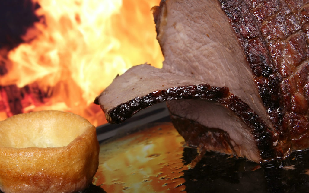 keto Yorkshire pudding: Roast beef and Yorkshire pudding with flames in the background