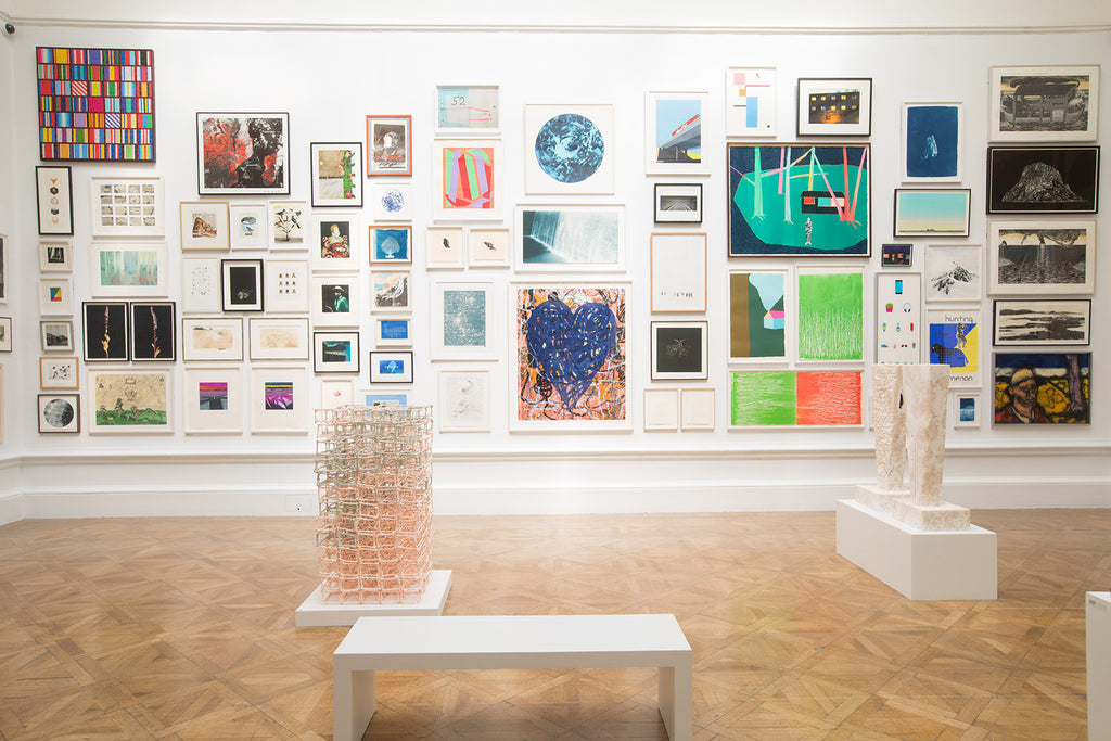 Photograph from the 2019 Royal Academy of Arts Summer Exhibition. 'The Showmen' by Richard Spare can be seen on the bottom left. 