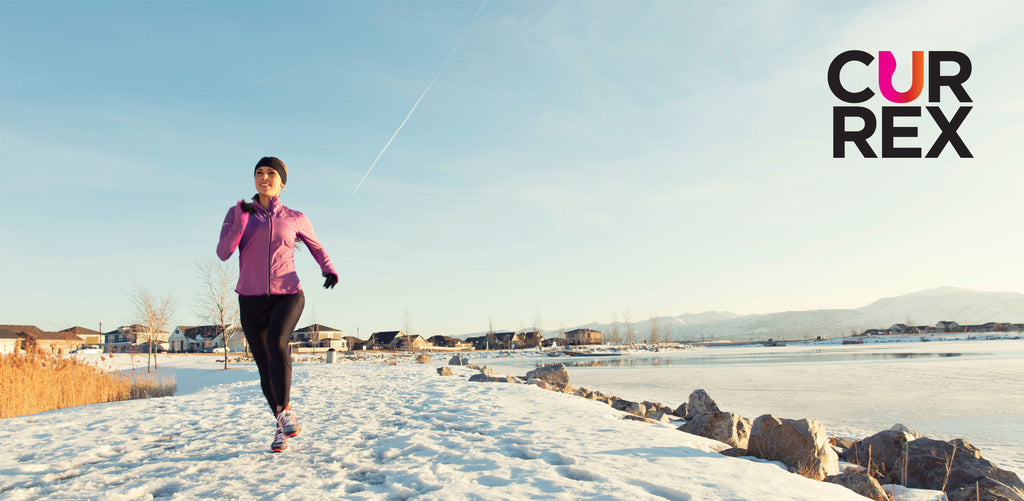 Woman running outdoors in winter