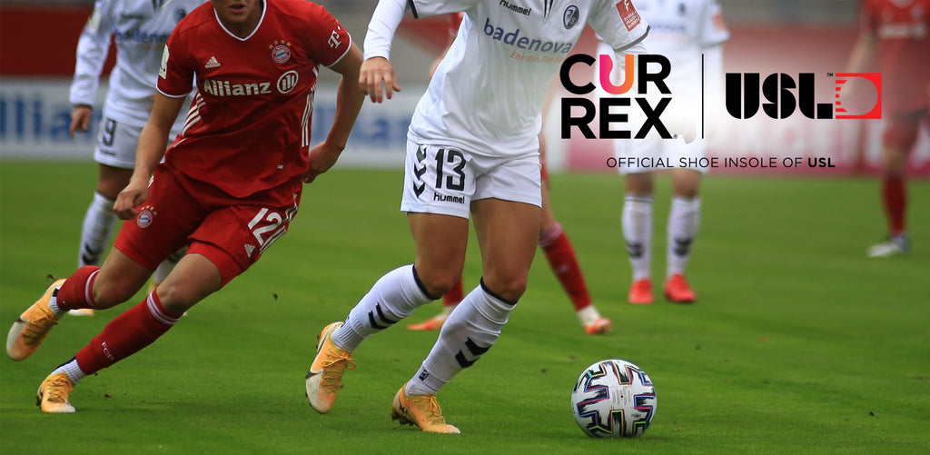 professional women’s soccer players playing soccer