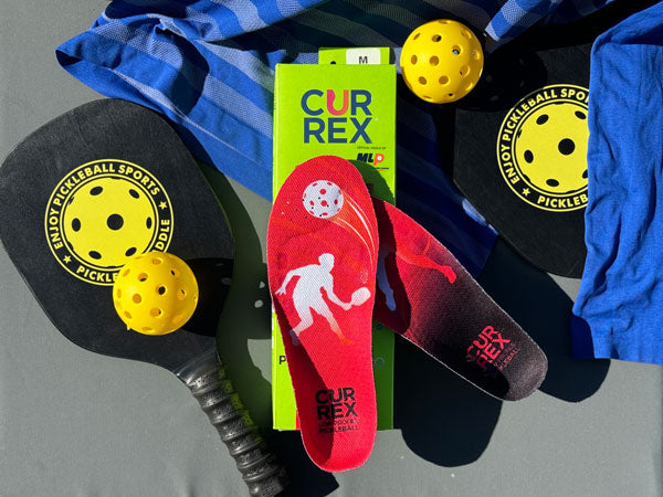 pickleball gear including balls, paddles and pickleball insoles